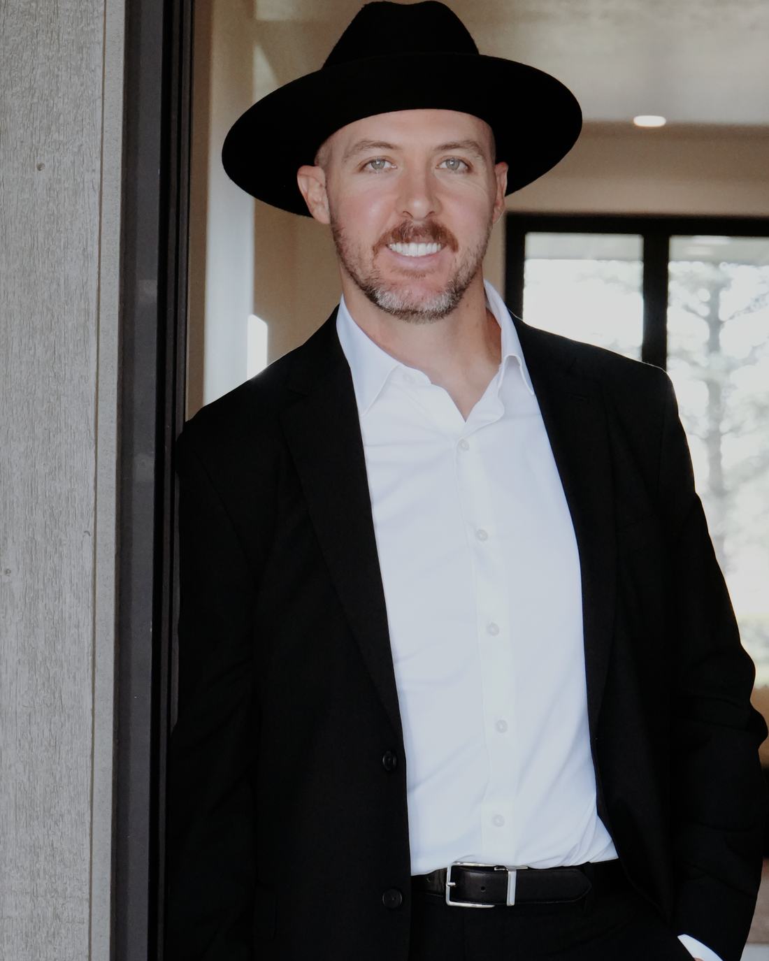 Mitch Wahl in the doorway of a Treasure Valley home