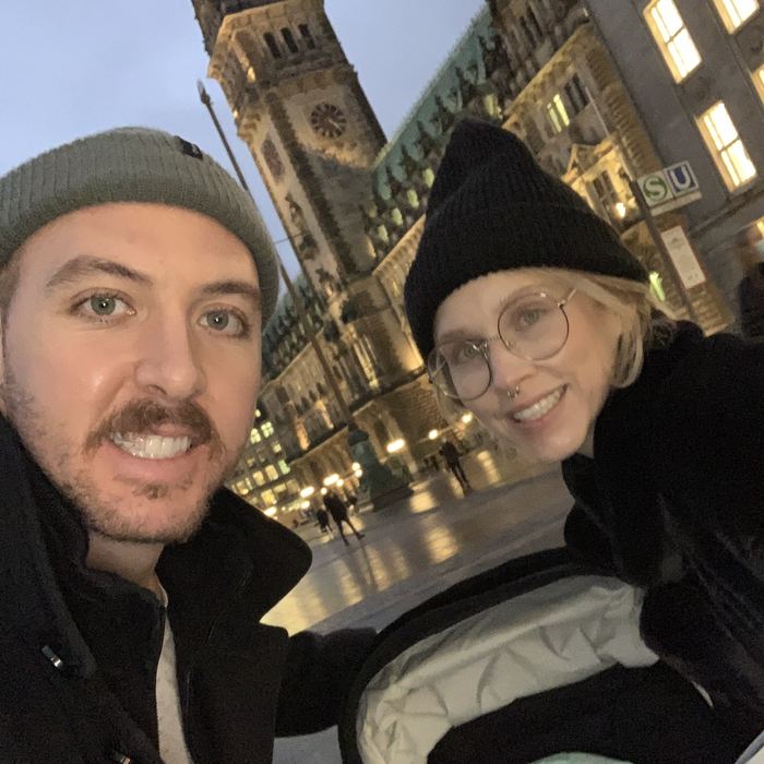 Mitch and Kellie with their baby son outside Hamburg city hall